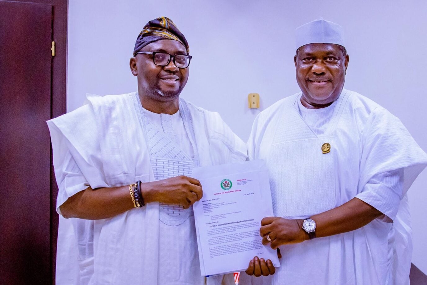  Adelabu, Akume pose with resignation letter