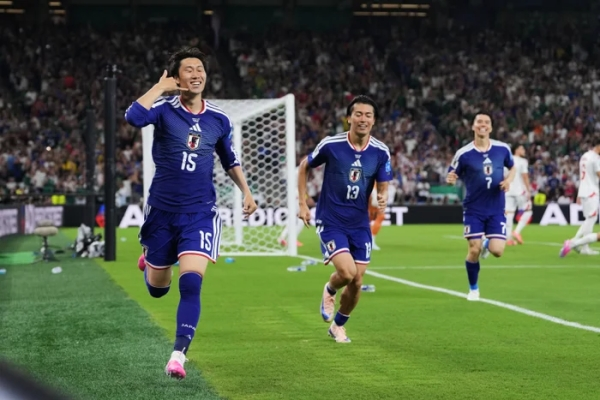 JAPAN SEAL KNOCKOUT BERTH AS CURACAO CELEBRATE HISTORIC DRAW