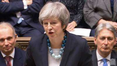 BREXIT DEAL IN TURMOIL AS MAY POSTPONES PARLIAMENT VOTE