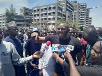 PRO-TINUBU GROUP STAGES PROTEST AGAINST ATIKU, OBI IN ABUJA